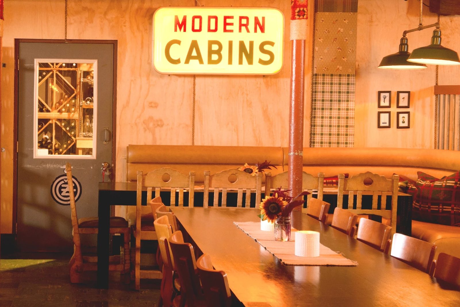 Booths and long tables under warm light in the Union dining room