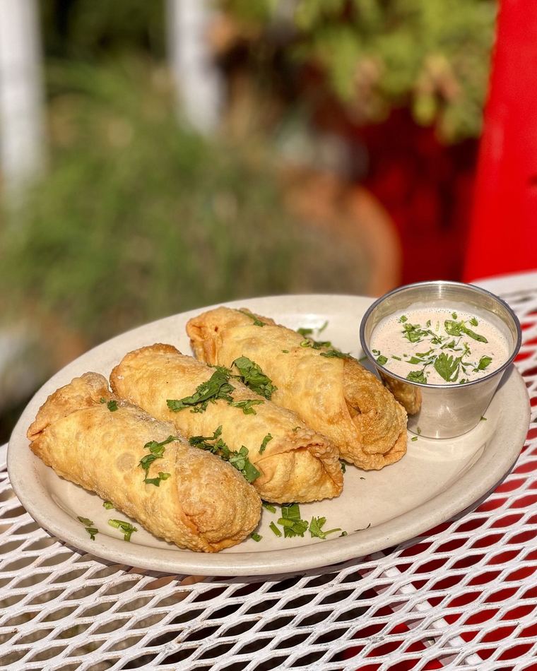 Something fried, with a dipping sauce