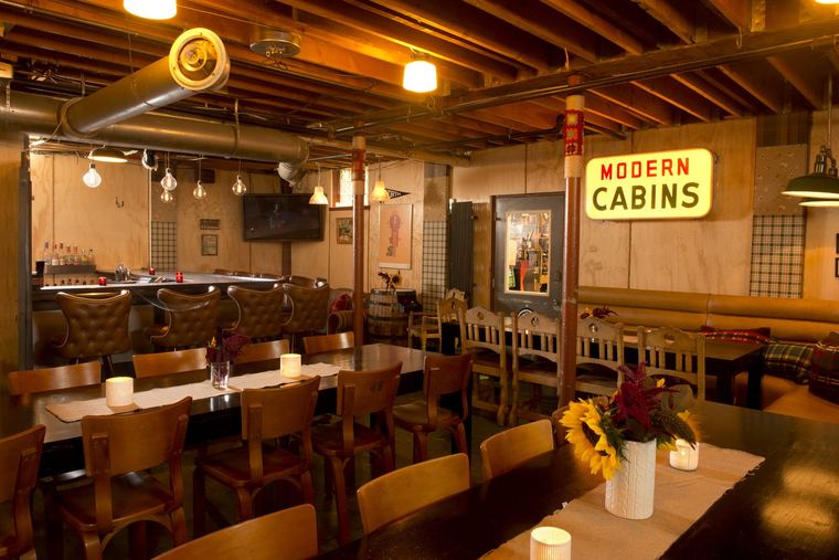 The bar and the Modern Cabins neon